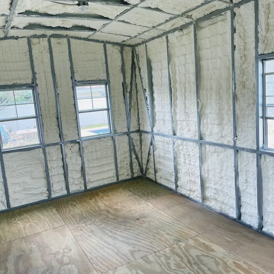 Closed-cell spray foam insulation applied to wall cavities in a residential project in Southampton